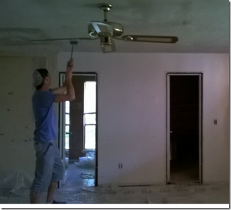 Q scraping popcorn off ceiling